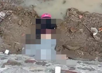 Wanita Berhelm Pink Tergeletak di Parit, Polisi: Identitas dari Probolinggo